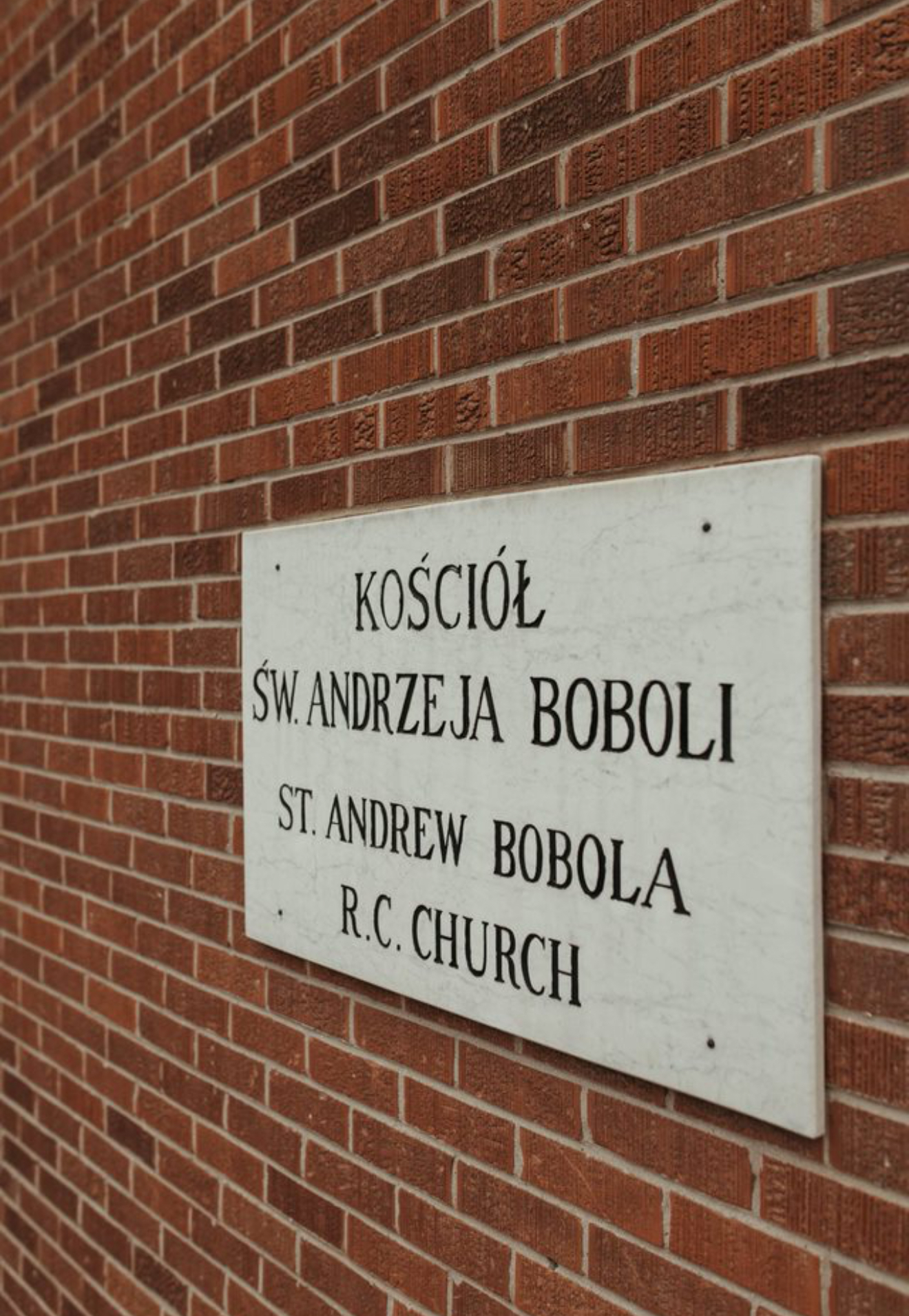 Parish Plaque on the Church Cornerstone outside St Andrew Bobola Church